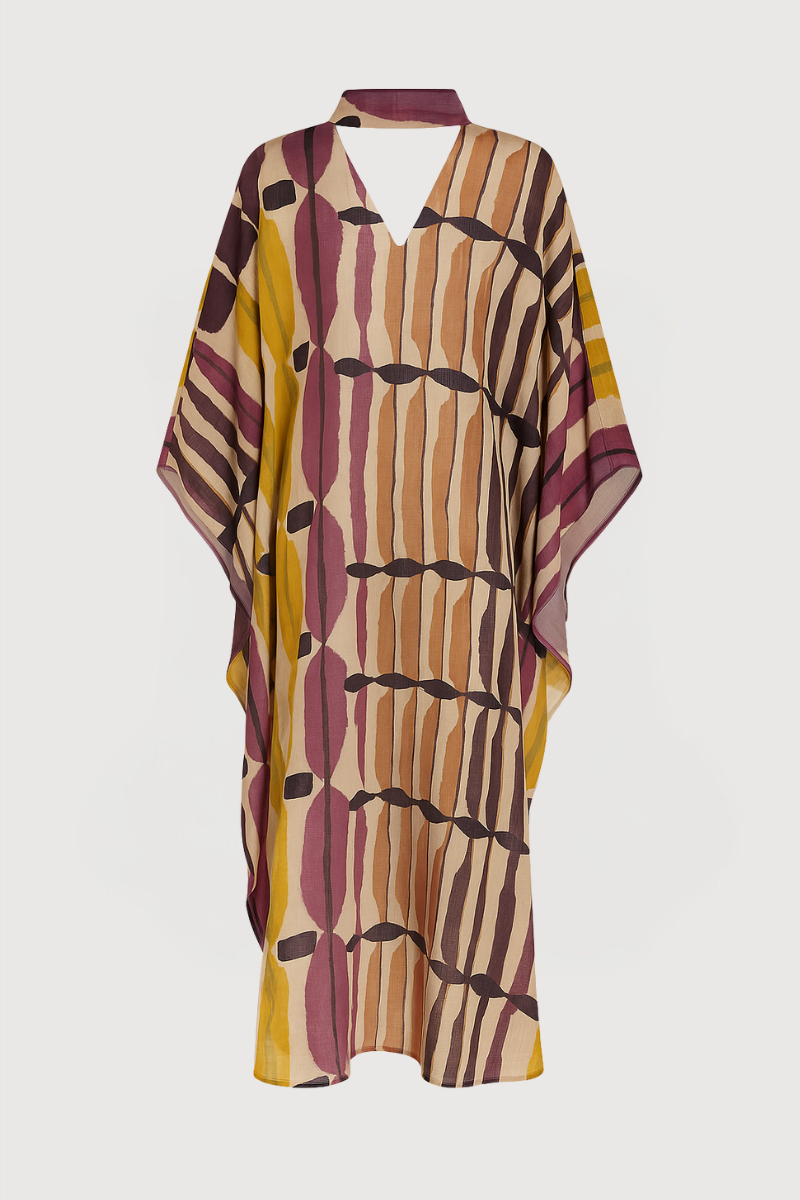 Vestido midi estampado con escote en V y cinta en cuello que se cierra con botones por la parte trasera. 